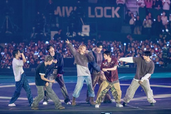 BTS Arirang World Tour performance with crowd lightsticks